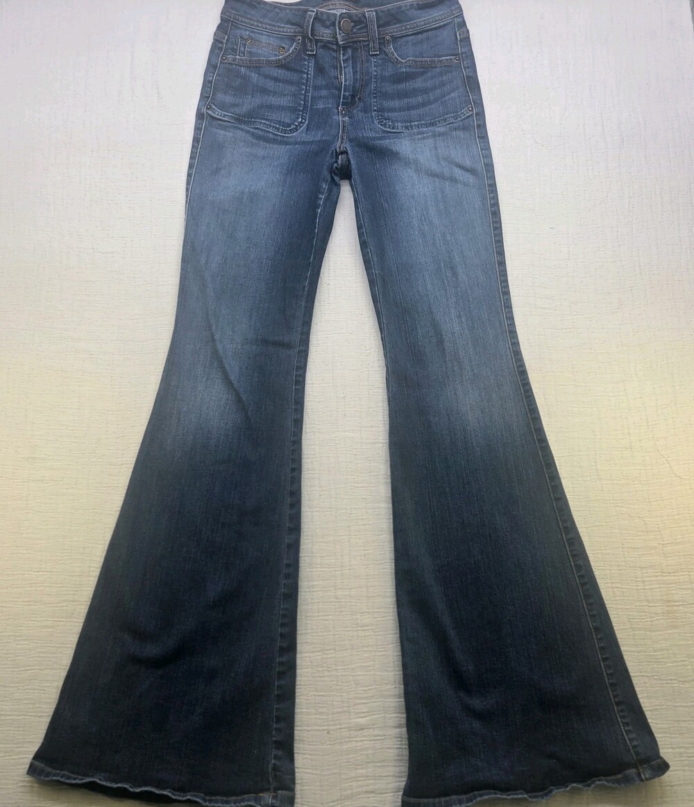 Bebe Womens Flare Leg Jeans Medium Wash Blue Denim Size 29 Made in USA